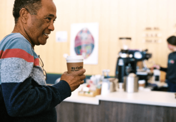 Individual enjoying a cup of B3 coffee