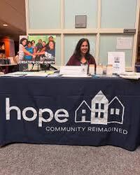 Laura Wells, Executive Director of HOPE, sharing information about HOPE