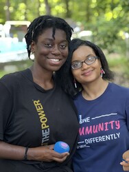 Image of two individuals enjoying a L'Arche event