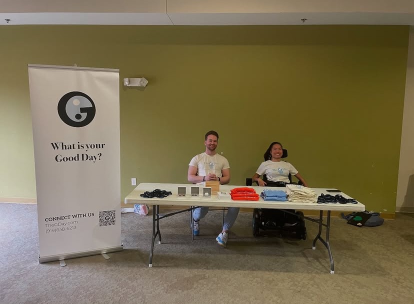 G House residents Colby and Elianna promoting The G Day and selling G Day merch